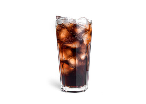 Cola With Ice In A Transparent Glass Isolated On A White Background.