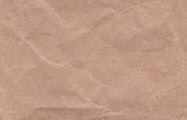 Crumpled cream paper background texture. Paper craft