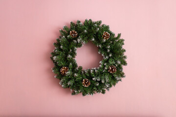 christmas wreath on the pink wall