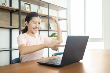 Asian business woman with notebook in the office