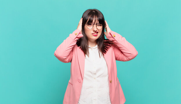 young business woman feeling frustrated and annoyed, sick and tired of failure, fed-up with dull, boring tasks