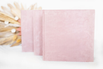 Pink textured photo albums