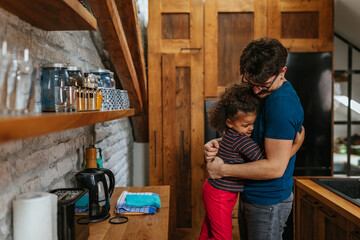 Father and daughter showing some love to each other