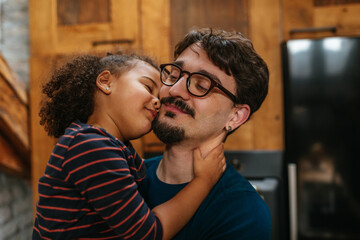 Portrait of happy father and daughter