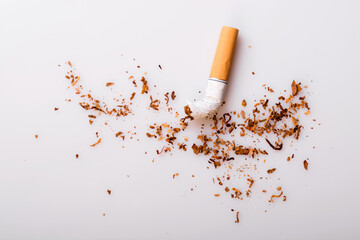 Broken cigarette on white background , World No Tobacco Day Tobacco and lung health concept .