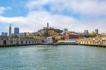 San Francisco, California, United States - August 14, 2016: Alcatraz cruise by ferry to Alcatraz island in San Francisco pier, California in the United States. San Francisco skyline on background.