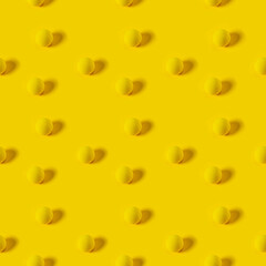 yellow texture balls on a yellow background. seamless pattern.