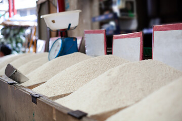 Variety of rice at street market. Outdoors Food marketplace
