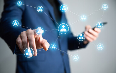 man holding phone with social network icon