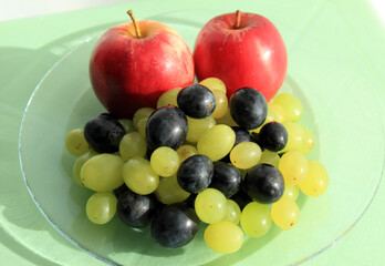 Fresh fruit on glass platter on the table