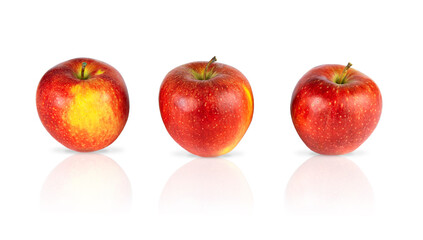 Three red apples isolated on white background, reflection.