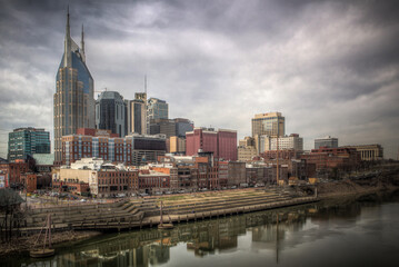 Fototapeta na wymiar The skyline of downtown Nashville on the banks of the Cumberland River. 
