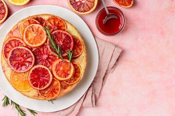 Blood orange upside down cake or pie  on a plate. Fruit citrus baking. Copy space. Top view.