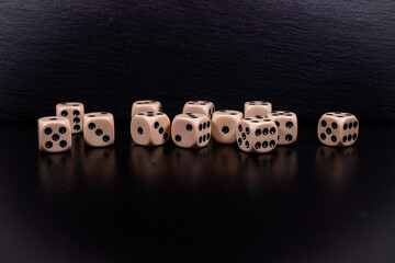 Wooden cube on black background