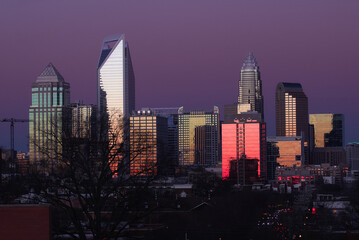 skyline of Charlotte North Carolina at sunset from the west side of the city 