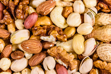 Background of the various nuts (almond, cashew, hazelnut, pistachio, walnut). Vegetarian meal. Healthy eating concept