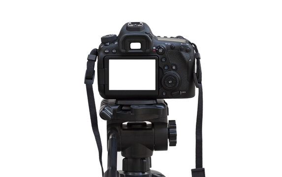 Dslr camera with white screen on the tripod isolated on white background. White screen camera	
