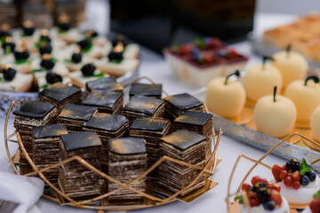 Close up view of sliced pieces of spartacus cake on the festive party table.