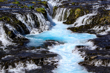 Fototapeta na wymiar The beautiful blue Brúarfoss waterfall, Iceland