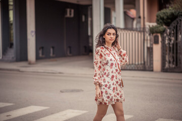 Fototapeta premium Woman walking in the city