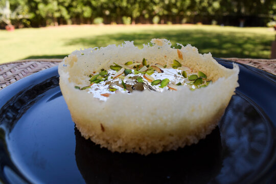 Traditional Indian festival dessert sweet. unique different from India rajasthan eaten during festivals like holi. with decorative background