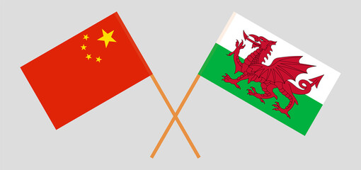Crossed flags of China and Wales. Official colors. Correct proportion