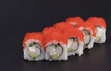 Sushi Rolls California Maki with Rice, avocado, cucumber, CRAB, TOBIKO and CREAM CHEESE