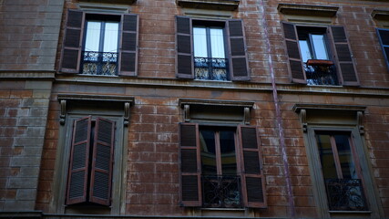 Fototapeta na wymiar Open window against and old wall