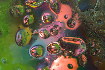 Colorful abstract texture with bubbles in pink green tones