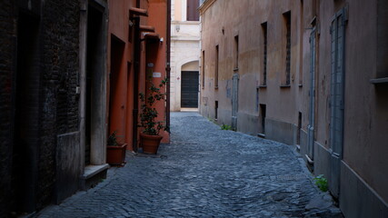 Old street in Trastevere, Rome, Italy. Trastevere is rione of Rome, on the west bank of the Tiber in Rome, Lazio, Italy. Architecture and landmark of Rome