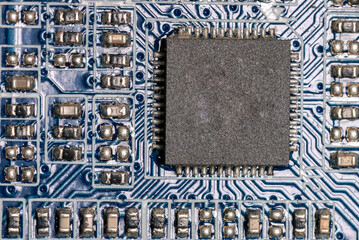 close-up of microcircuits on a motherboard in a personal computer