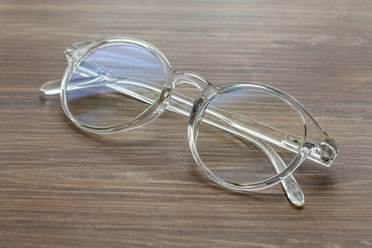 Glasses for vision with dioptria on the wooden table office