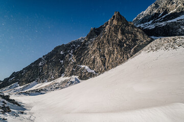 Beautiful winter mountain alpine like landscape of High Tatras, Slovakia. Snow in the mountains, rocky peaks of Gerlachovsky stit, Velicky stit and others. High Tatras National Park, Slovakia.