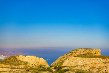 Rocky coast Landscape with ship on sea, Spain