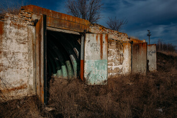 Entrance to abandoned underground depot in Soviet military base © Mulderphoto