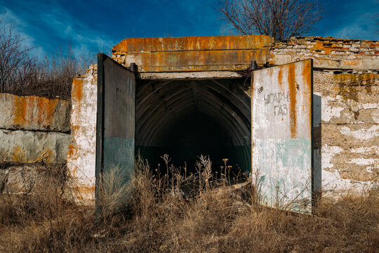 Entrance to abandoned underground depot in Soviet military base