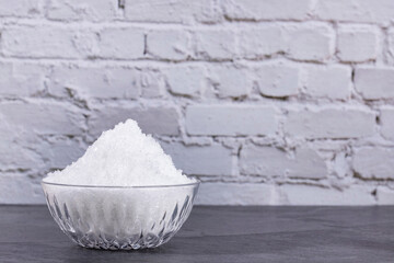 Magnesium chloride in the ceramic bowl - Text space
