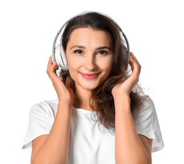 Naklejka premium Enjoying music and audio content, young woman listening with wireless headphones