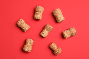 Champagne corks on color background