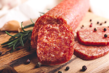 Tasty salami with spices, closeup