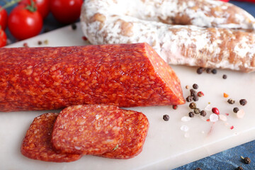 Tray with tasty salami, closeup