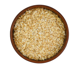 oatmeal porridge in a clay plate isolated on a white background