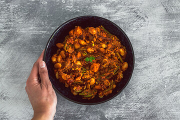 vegan autumn hot pot with sweet potato green beans buttter beans and capsicums, healthy plant-based food