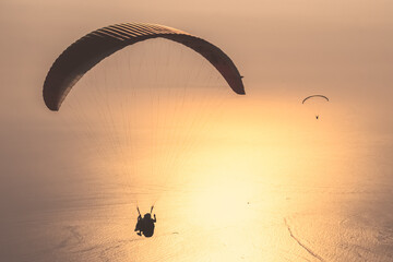 Paraglider flying on Oludeniz beach in Fethiye, Mugla, Travel destination. Summer and holiday...