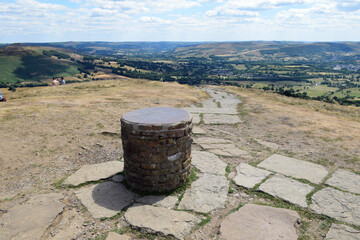 A Triangulation station or Trig Point at the top of Mam Tor in the Peak District, Derbyshire, UK -...