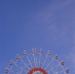 ferris wheel on a blue sky