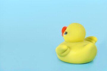 yellow duck on blue background 