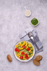 Pasta with vegetables and green sauce