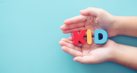 Kid word on woman hands.Family adoption.Safe and protect child kids.bully in school.Pediatric healthcare medical.Kid Vaccine.Online education learning at home.New normal boy and girl.People children.