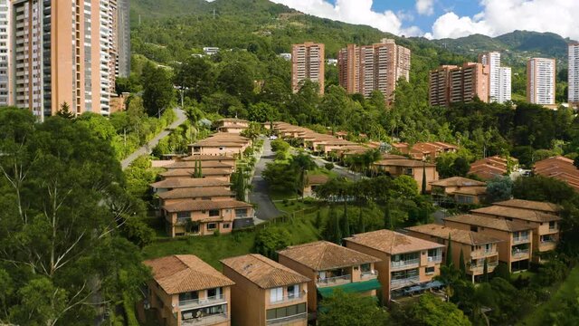 Aerial Establishing Shot of Private Residential Community in Mountainous Colombian City